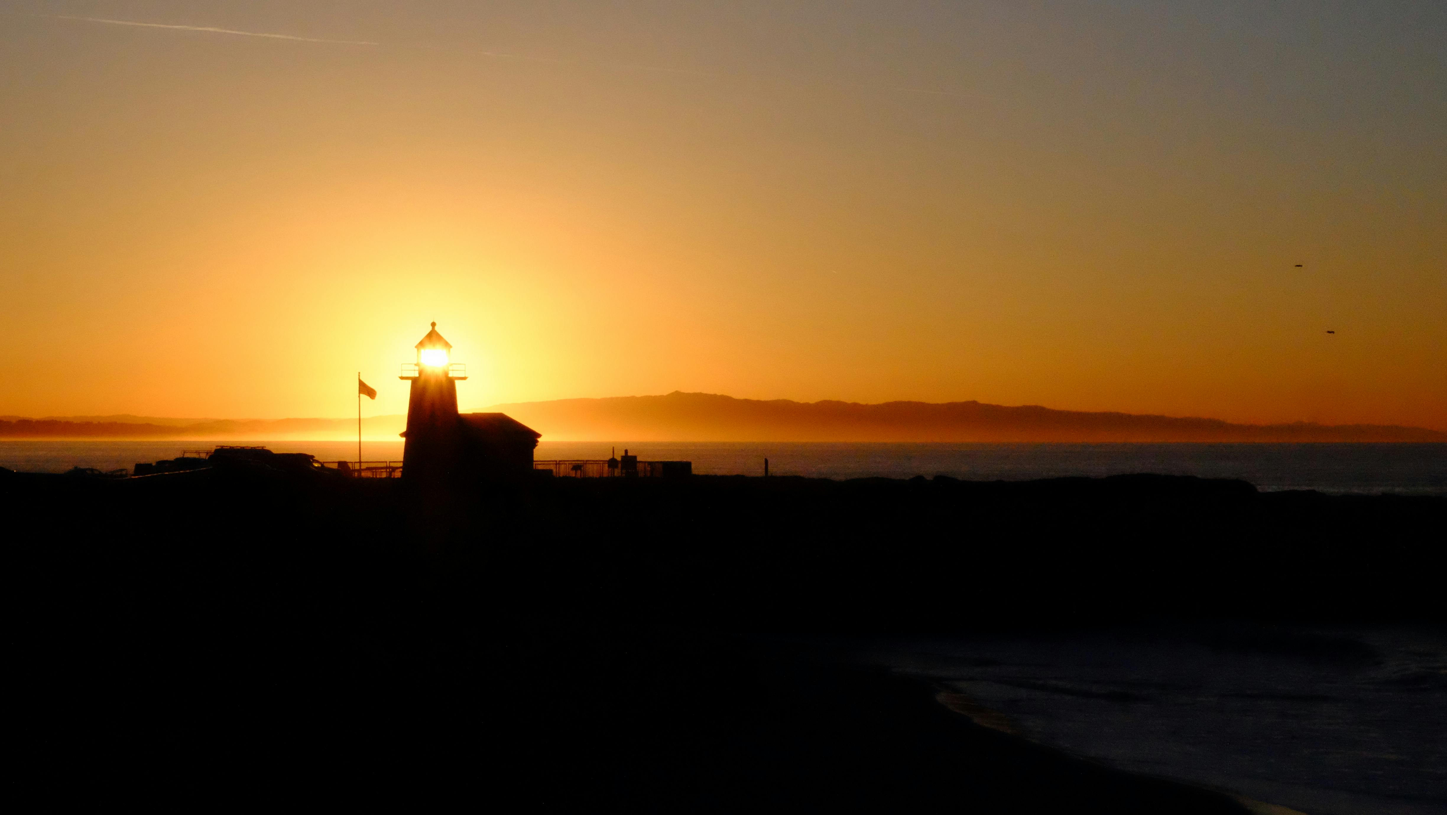 Lighthouse silhouette at sunset in Santa Cruz
